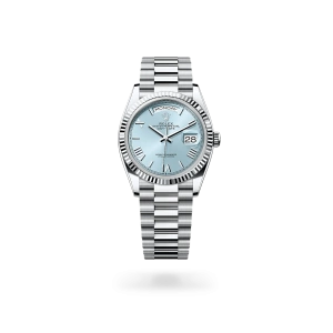 Rolex Day-Date 36 de platino con esfera azul glaciar, bisel estriado, y brazalete President - Bentrani